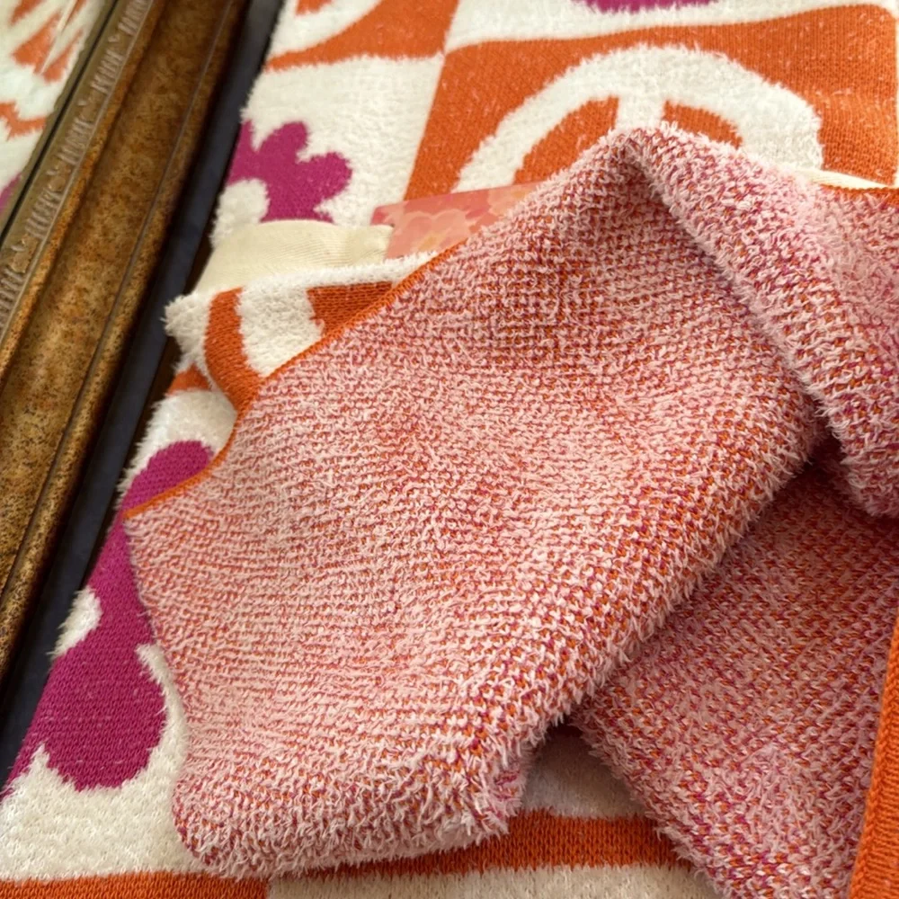 Chelsea & Theodore Peace Symbol & Flower Decrative Throw. Orange Pink & White.